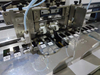 Macchina per creazione intelligente per creazione di coperture rigide automatiche